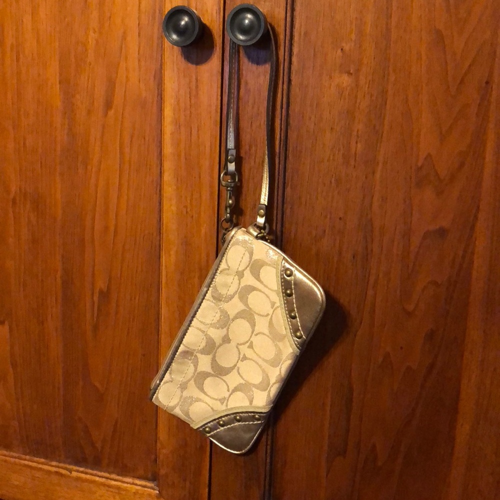 Sparkly gold Coach wristlet
